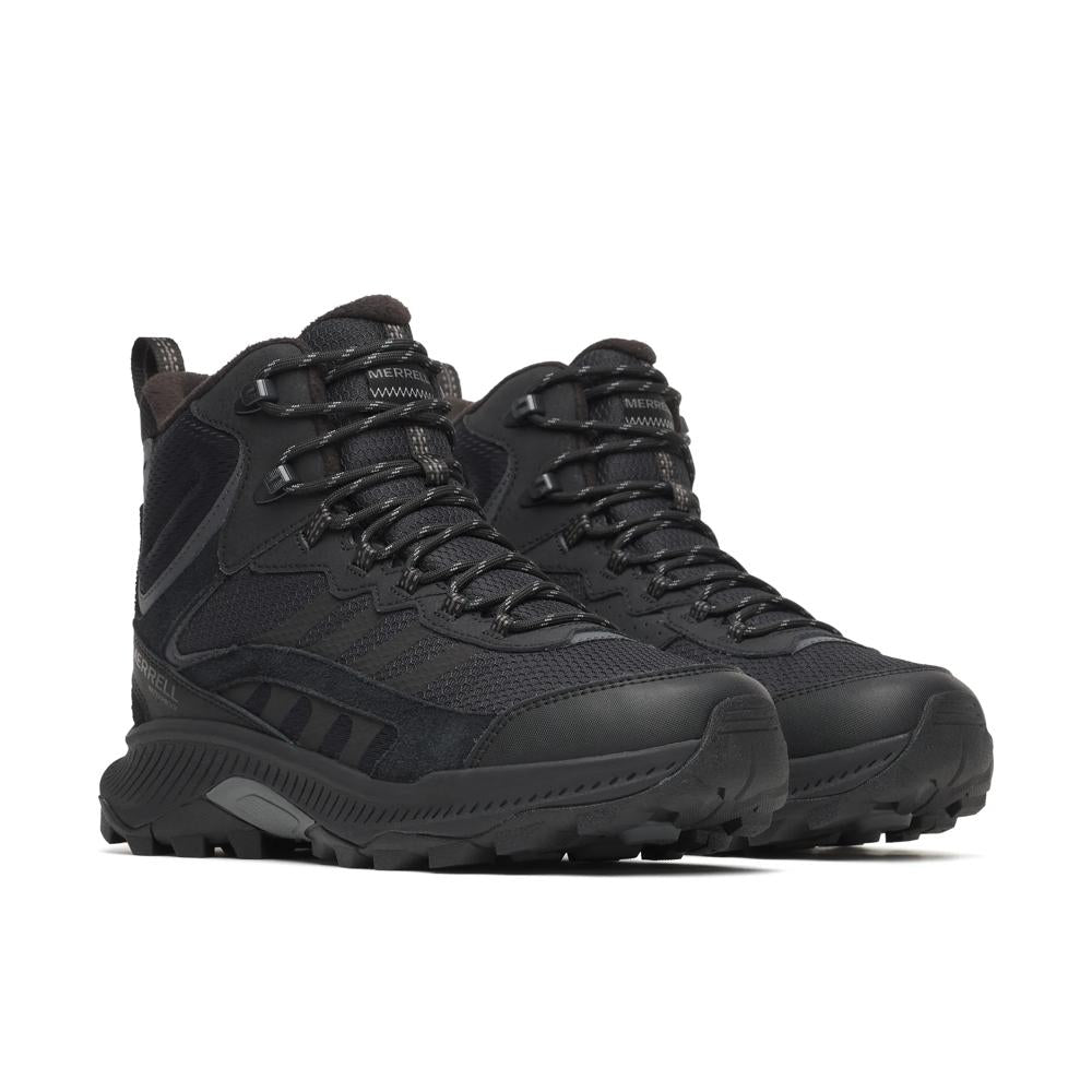 Black sneakers with gray accents on a white background