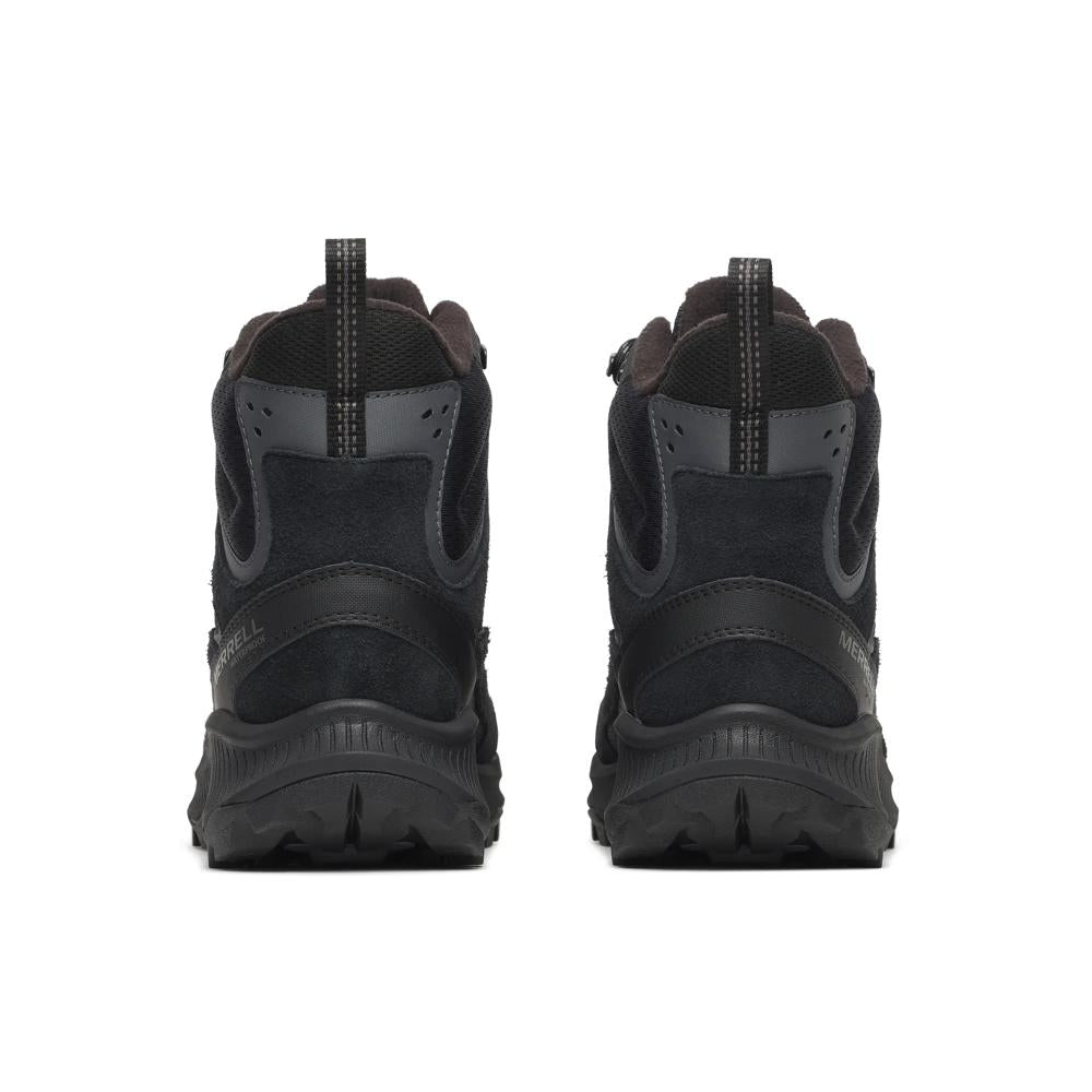 A pair of black and dark gray rugged outdoor boots shown from the back, featuring thick lugged soles and textured synthetic and suede-like uppers, set against a plain white background.