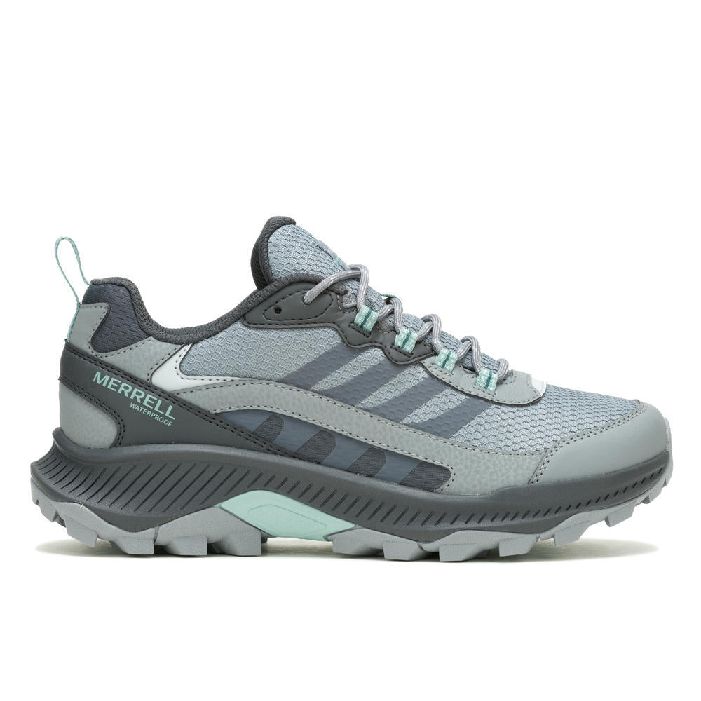Gray and teal hiking shoe with Merrell branding on a white background