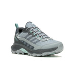 Gray and teal hiking shoe on a white background
