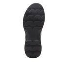 A top-down view of a black shoe sole with textured tread patterns and a debossed brand logo that reads 'K-Swiss'.