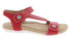 Red sandal with beige sole on a white background