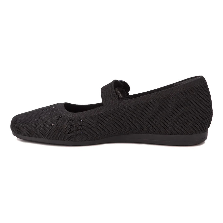 Black sneaker with butterfly designs on a white background