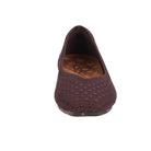 Brown flat shoe with textured pattern on a white background
