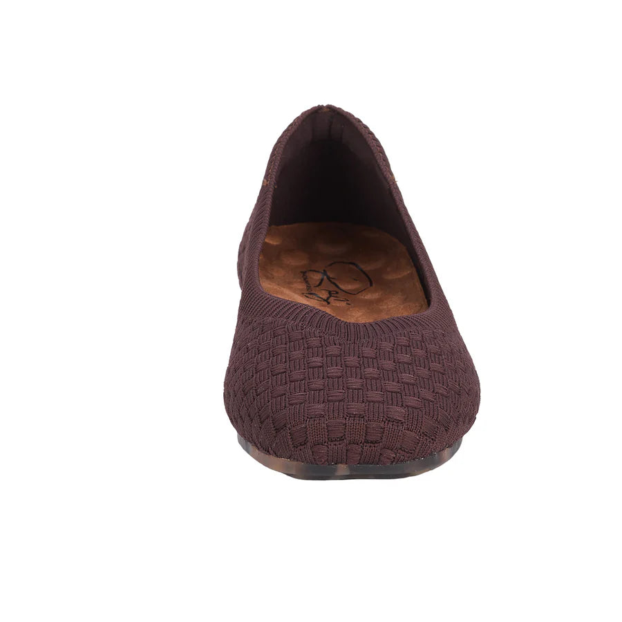 Brown flat shoe with textured pattern on a white background
