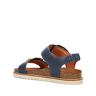 Navy blue sandal with cork sole on a white background