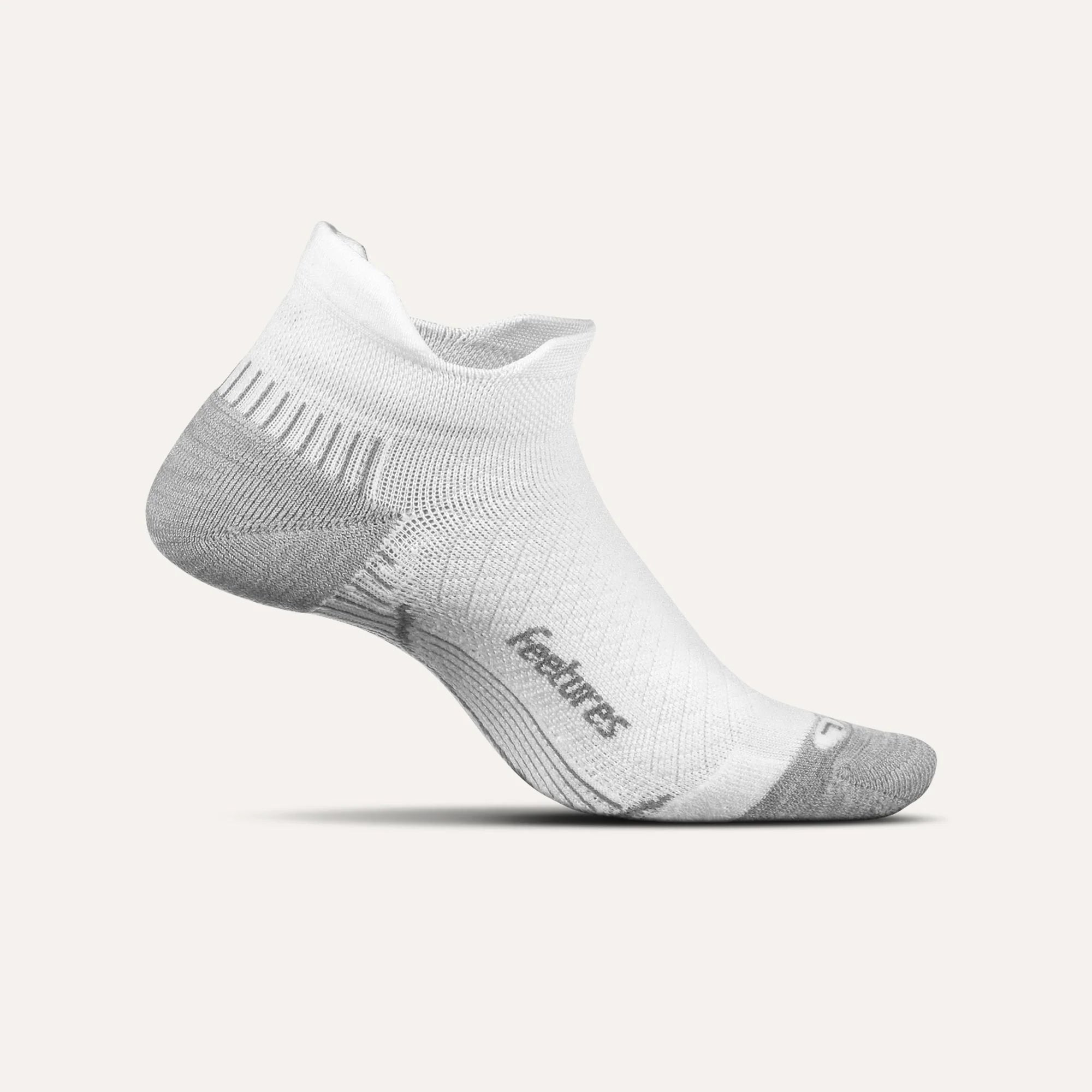 White ankle sock with gray accents on a white background