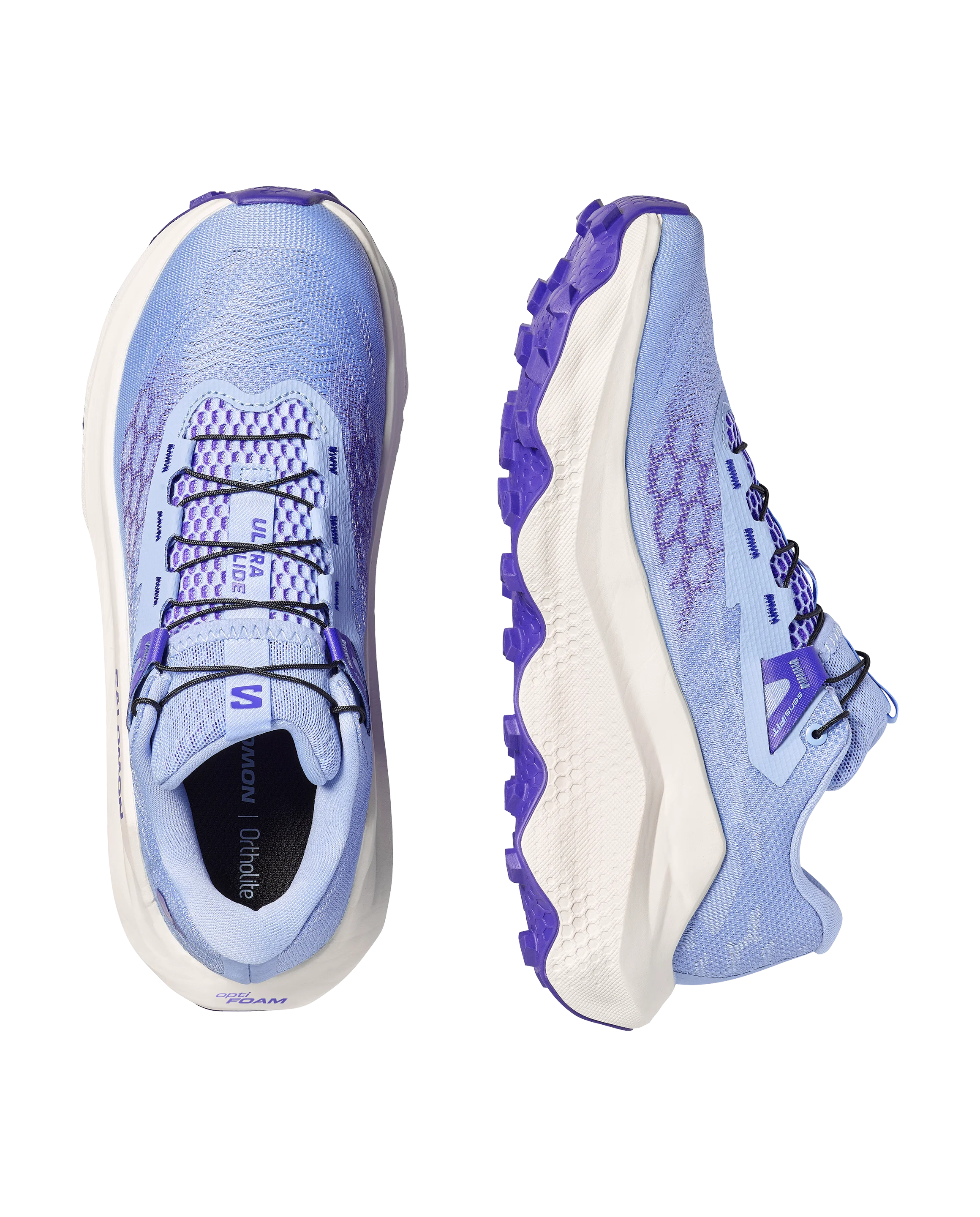 Pair of blue and purple running shoes on a white background