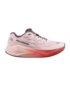 A Salomon running shoe in light pink and coral red, shown from a side profile on a plain white background.