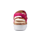 Pink sandal with cork sole on a white background