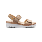 Beige sandal with cork sole on a white background