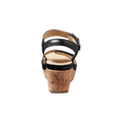 Black wedge sandal with cork sole on a white background