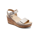 Silver wedge sandal with cork sole on a white background