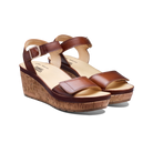 Brown wedge sandals with cork sole on a white background