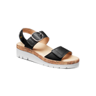 Black sandal with cork wedge sole on a white background