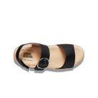 Black sandal with a visible brand label on a white background