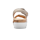 Beige sandal with cork sole on a white background