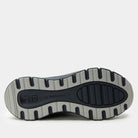 Close-up of a shoe sole with 'RB' branding on a white background