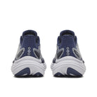 Pair of blue and gray athletic shoes on a white background