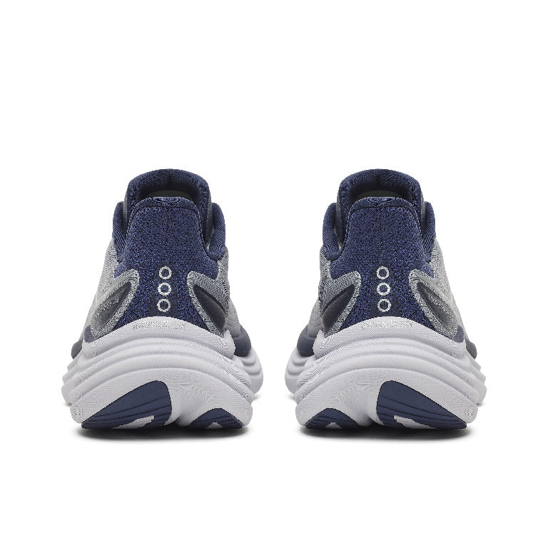 Pair of blue and gray athletic shoes on a white background