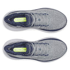 Gray running shoes with navy accents on a white background
