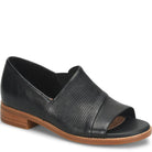 Black open-toe shoe with brown sole on a white background