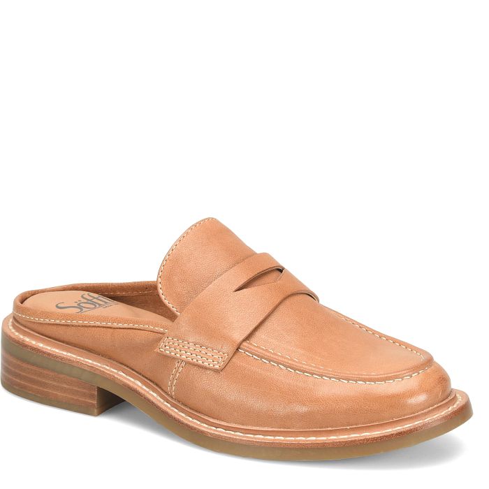A tan leather slip-on loafer mule with a low stacked heel, shown from a three-quarters angle on a white background.
