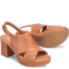 Brown platform sandals on a white background