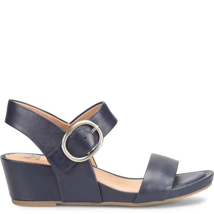 Navy blue sandal with a round buckle on a white background