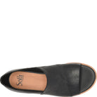 Black leather sandal with brown insole on a white background