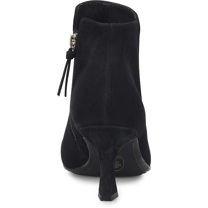 Black suede ankle boot with a kitten heel and side zipper, shown from a rear three-quarter angle on a white background.