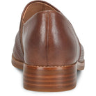 Brown leather loafer shoe on a white background