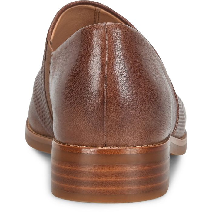 Brown leather loafer shoe on a white background