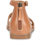 Tan sandal with a zipper on a white background