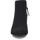 A black suede ankle boot with a side zipper and tassel detail, shown from a front-facing perspective on a white background.