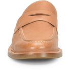 A tan leather penny loafer shown from a front-facing angle on a clean white background.