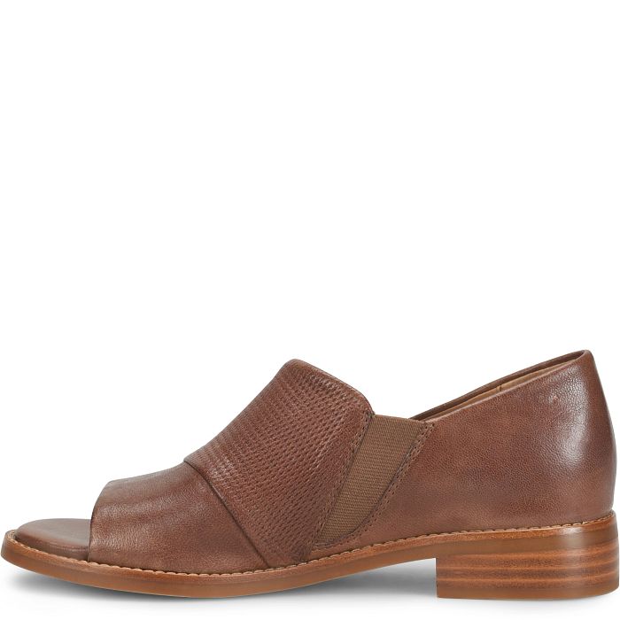 Brown leather shoe on a white background