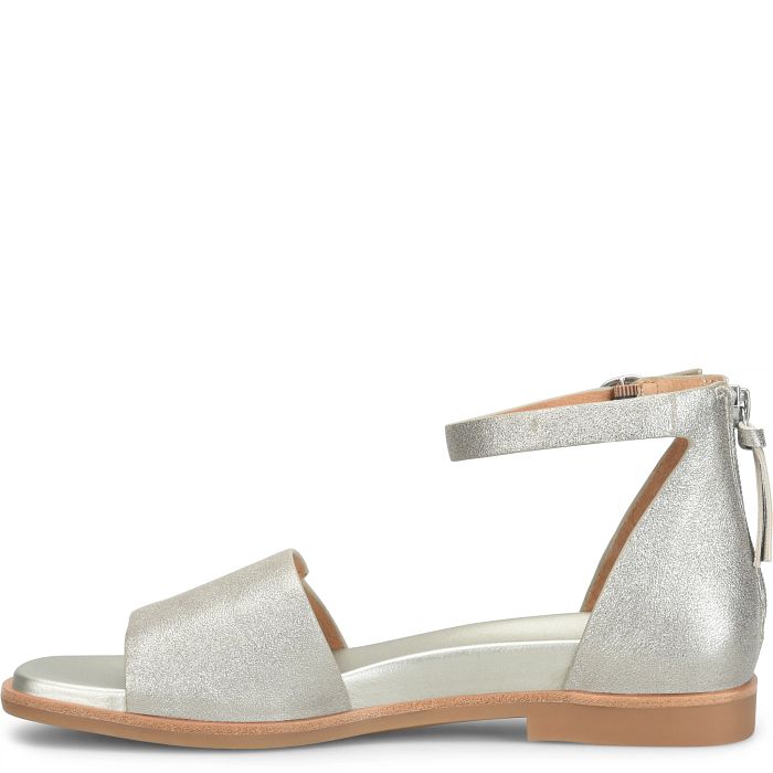 Silver sandal with a strap on a white background