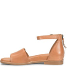 Tan sandal with a thin strap on a white background