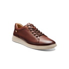 Brown leather sneaker on a white background