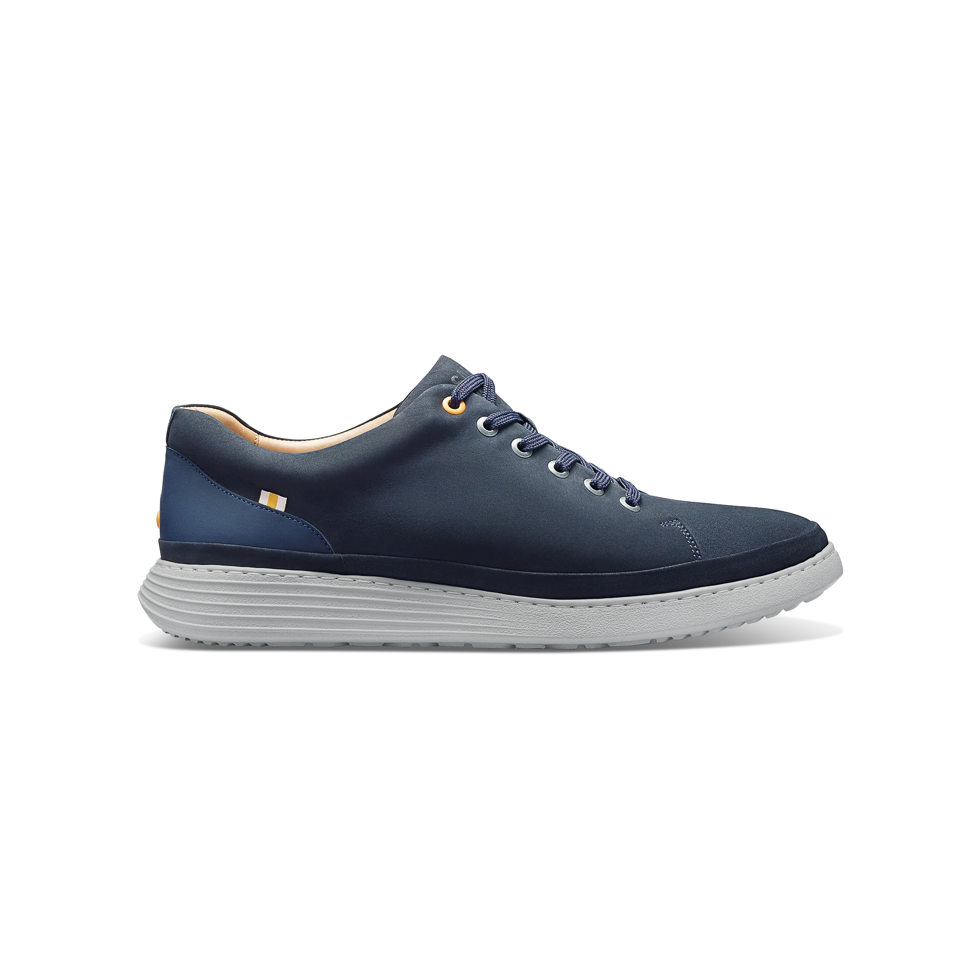 Navy blue sneaker with white sole on a white background
