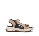 Beige sandal with black accents on a white background