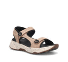 Beige sandal with black accents on a white background