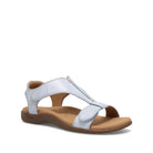 White sandal with brown sole on a white background