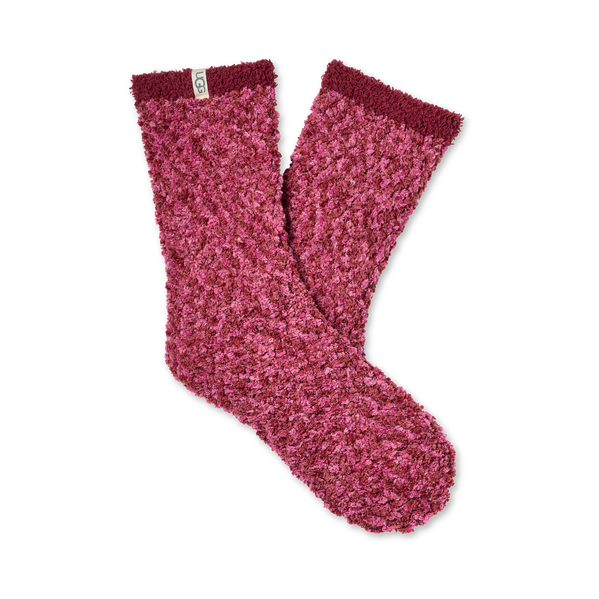 A pair of fuzzy, textured crew socks in a dusty rose pink color, displayed against a clean white background.