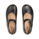 Pair of black leather shoes with a strap on a white background