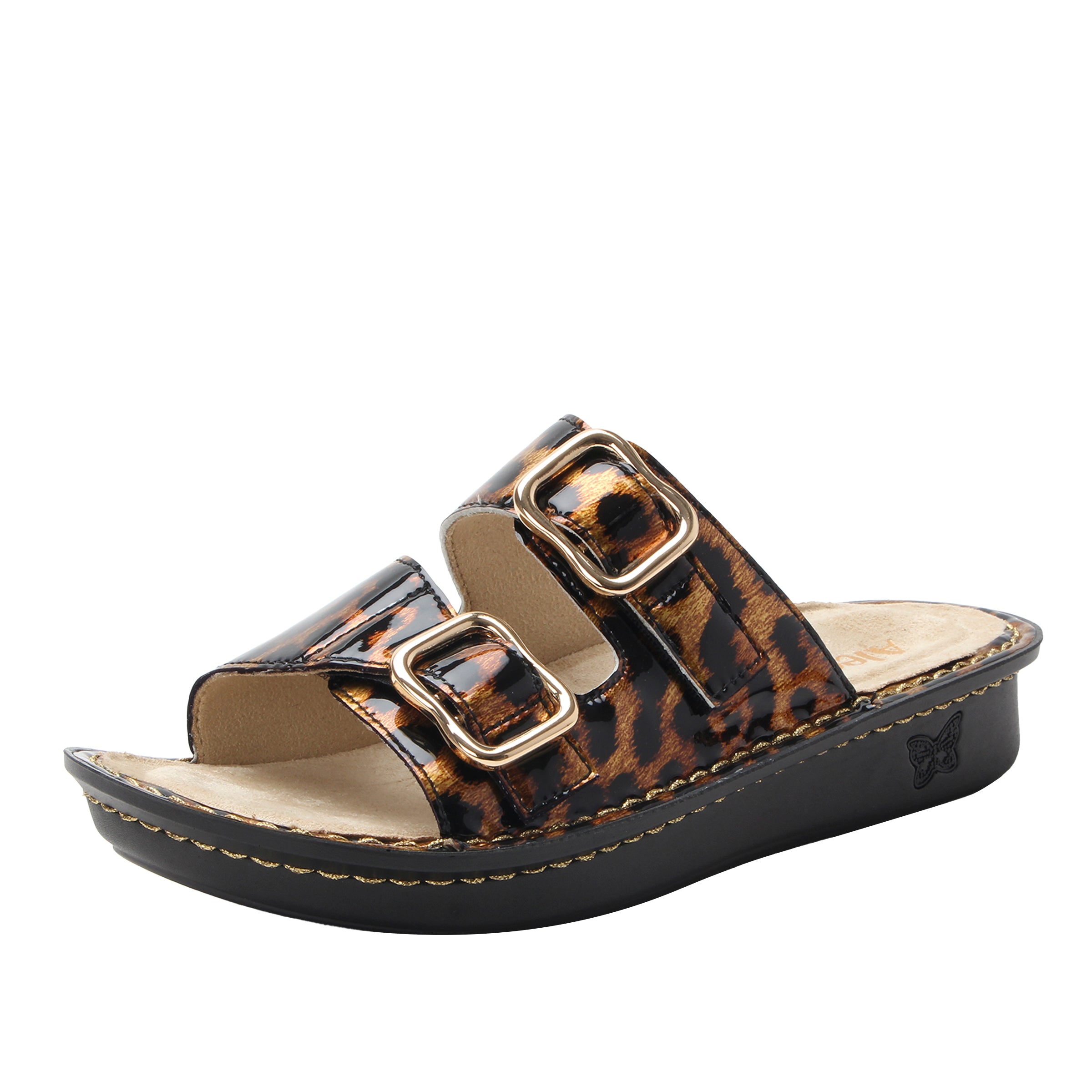 Leopard print sandal with gold buckles on a white background