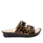 Leopard print sandal with a black sole on a white background