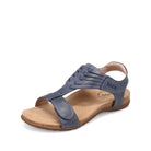 Blue sandal with a brown sole on a white background