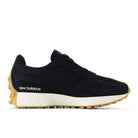 Black New Balance sneaker with a white sole on a white background